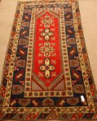 Persian Shiraz red and blue ground rug,