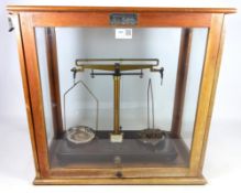 Brass chemical balance scale and set of weights,