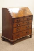 Early Georgian mahogany and figured mahogany bureau, fall front above four graduating drawers,