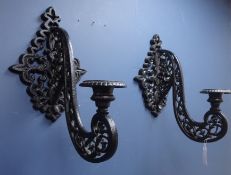 Pair of large ornate painted cast iron wall sconces,