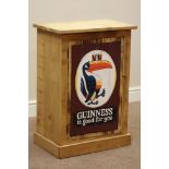 Waxed pine cupboard with 'Guinness is good for you' painted door, W54cm, H76cm,
