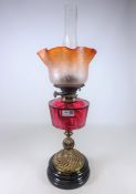 Victorian cranberry glass oil lamp with etched glass shade,