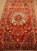 Persian Mashed red ground rug, 267cm x 157cm Condition Report <a href='//www.