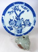 19th Century blue and white Arita type charger decorated with exotic birds and blossom in