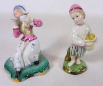 Two Höchst figures; servant girl and boy with basket of fruit,