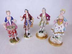 Pair of continental 19th Century figures of a man purchasing flowers from vendor and a pair of