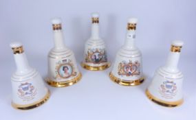 Five Commemorative Wade whiskey decanters,