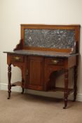 Edwardian walnut washstand, black marble top and raised splash back, two drawers and cupboard,