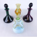 Pair of amethyst and emerald green glass decanters with 'S' stamped to base,