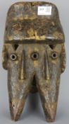 Tribal Masks, West African carved wood forehead mask, of conjoined Crocodiles and faces,
