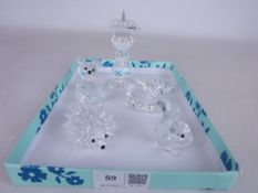 Five Swarovski crystal models; hedgehog, squirrel, bear, swan,