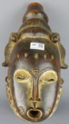 Tribal Masks; West African Côte d'Ivoire carved wood mask, highlighted with Kaolin white pigment,