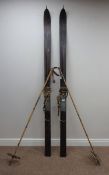 Pair of early 20th Century wooden skis with cane poles Condition Report <a