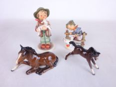 Hummel figure of a boy with lamb and another with a duck and two Beswick foals (4)