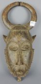 Tribal Masks; West African carved wood mask, probably Yaure, Côte d'Ivoire,