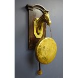 Early 20th century oak & brass dinner gong, horse head support engraved 'Grand Parade,