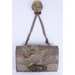 Japanese Meiji period embroidered tobacco pouch decorated with a dragon amongst clouds and brass