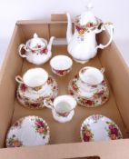 Royal Albert 'Country Roses' teaware; large tea pot, coffee pot, two cups and saucers,