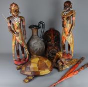 Large carved wooden turtle, two African figures, spears,