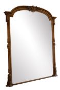 Large Edwardian gilt framed mirror, stepped arched plate in with lotus cornice and leaf cresting,
