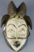 Tribal Masks; West African, South Gabon, carved wood Punu mask,