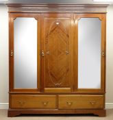 Edwardian mahogany triple wardrobe, two bevelled mirror doors, two drawers,