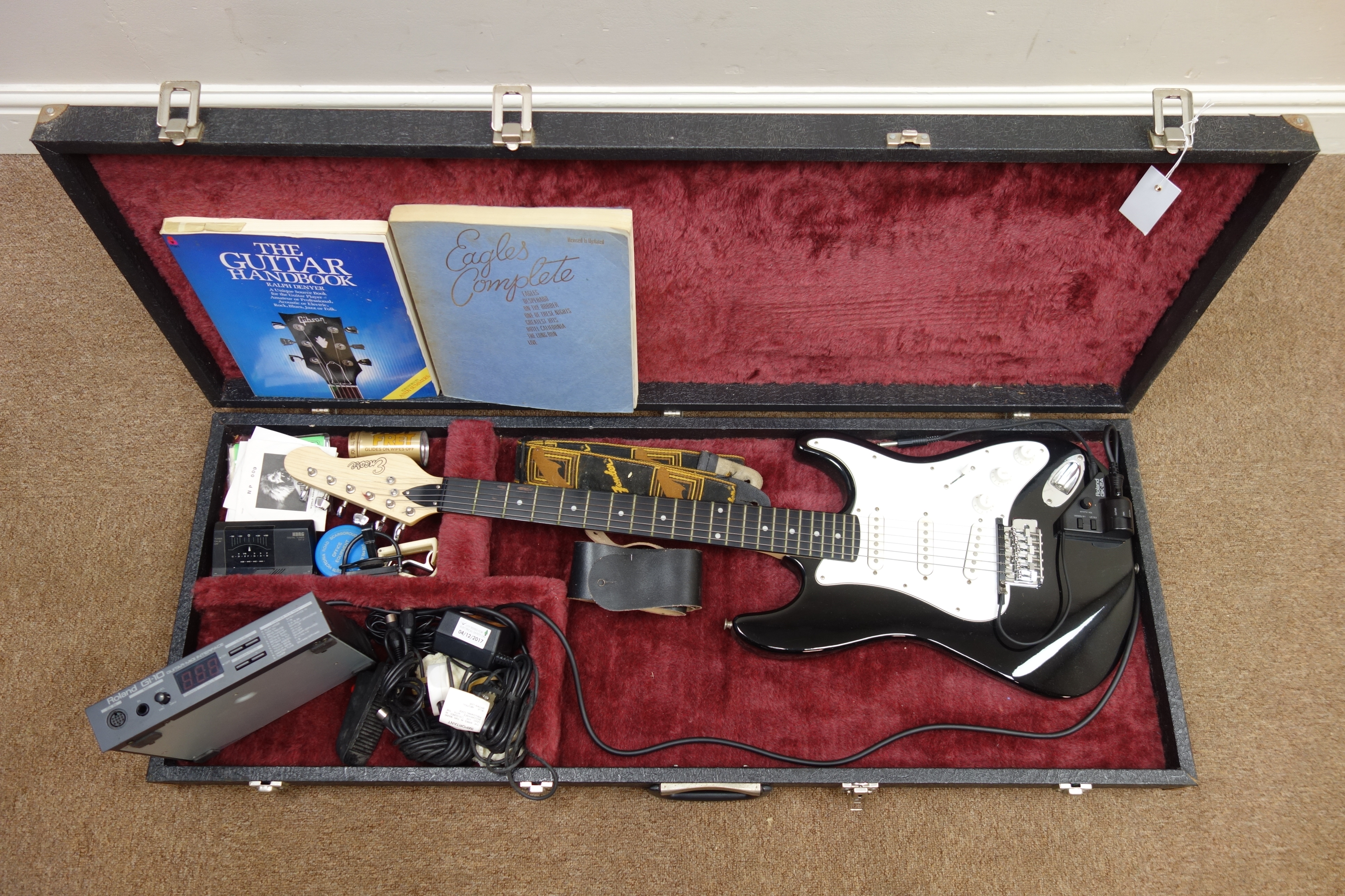 Encore electric guitar with Roland GK 2a pickup and Roland GI-10 guitar-midi interface in carry