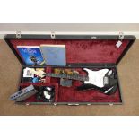 Encore electric guitar with Roland GK 2a pickup and Roland GI-10 guitar-midi interface in carry