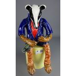 'Brock The Badger' ceramic model on stand,