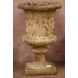 Large stone effect garden urn, decorated with classical Greek party scenes and fruit, D61cm,
