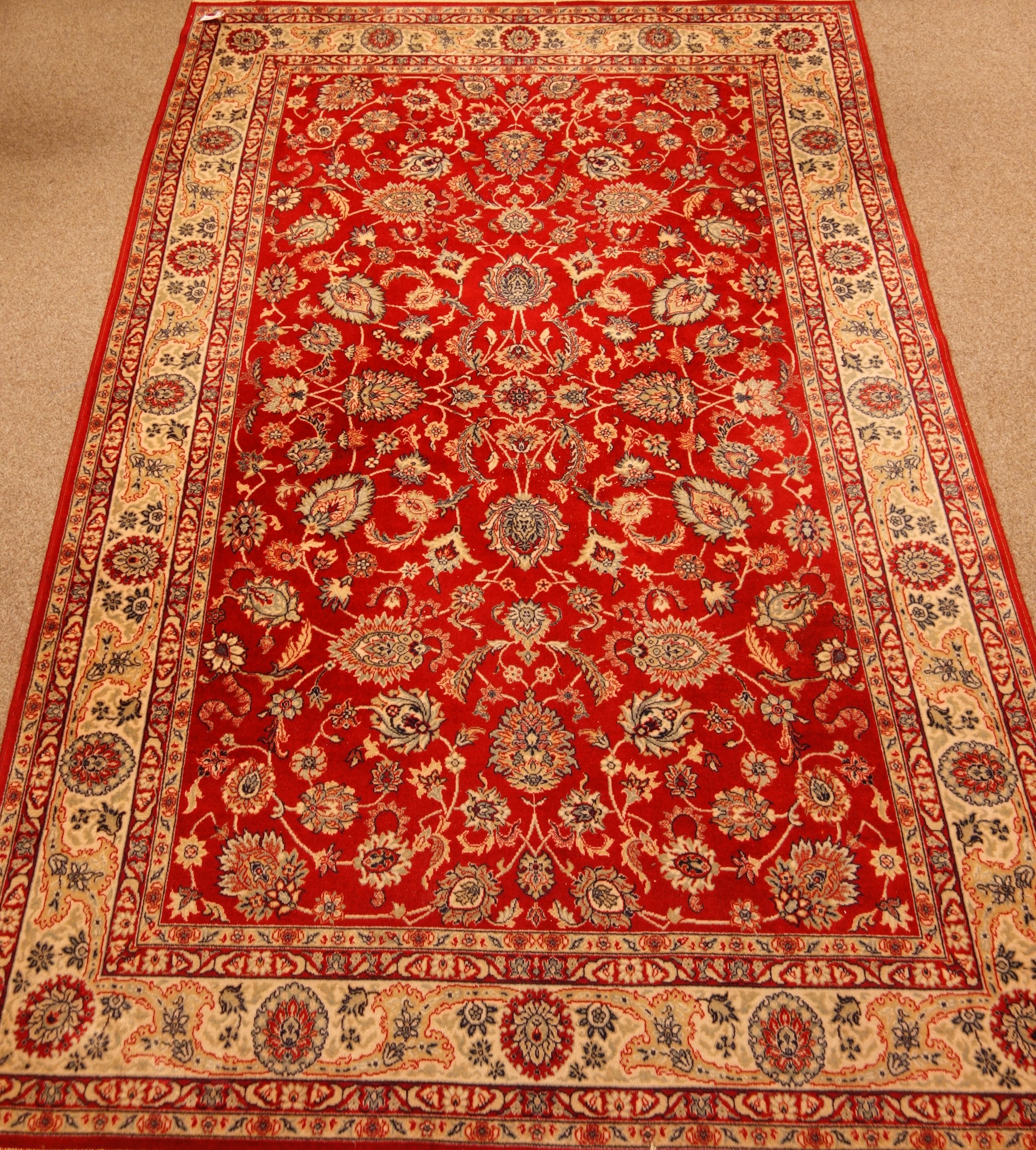 Persian Ziegler design red ground rug, interlacing stylized floral field,