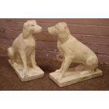 Pair composite stone dogs figures,