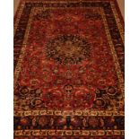 Persian Kashan plum ground rug carpet, large central rosette medallion,