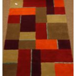 Harlequin 'Lona' contemporary multi coloured woollen rug,