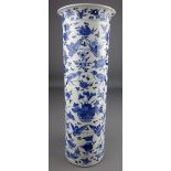 Tall 19th Century Chinese blue and white cylindrical vase decorated with birds insects and flowers.