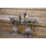 Pair cast metal garden stags on spherical mounts, figures/gate post finials,