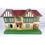 Tri-ang twin gable Dolls House with metal windows,containing some furniture, W70cm,