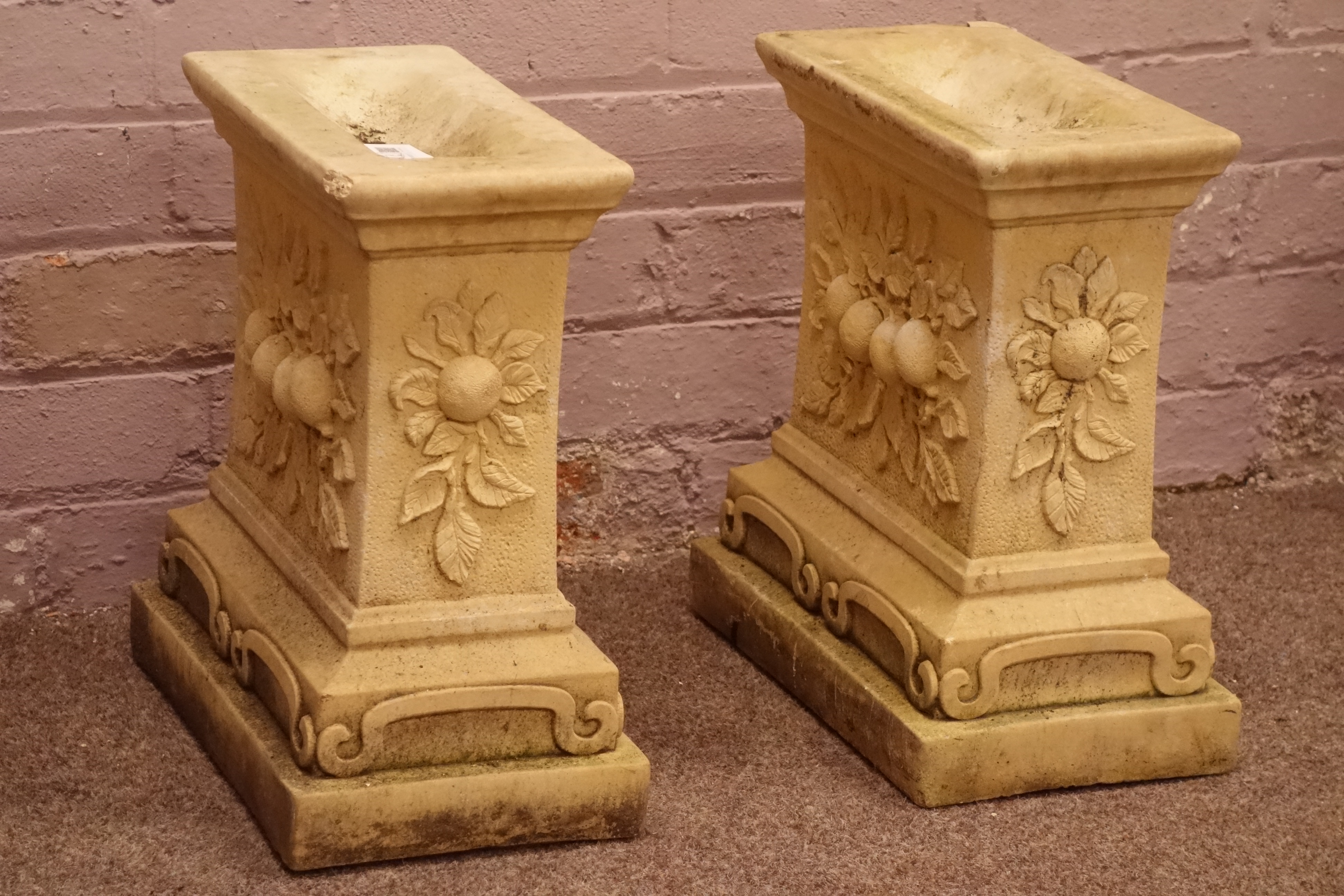 Pair composite stone garden bench supports, decorated with fruit and flowers,