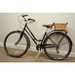 Vintage 7-speed town bicycle with leather saddle