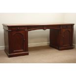 Large Victorian mahogany sideboard, three drawers, two pedestals enclosed by arched panelled doors,