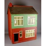 Painted wooden two storey dolls house with some furniture, W55,