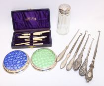 Collection of Victorian silver handled button hooks, two silver rimmed glass coasters, sugar shaker,