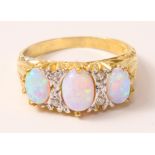 Gold-plated three stone opal ring Condition Report <a href='//www.davidduggleby.