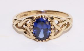 Celtic style 9ct gold ring set with a blue spinel hallmarked Condition Report