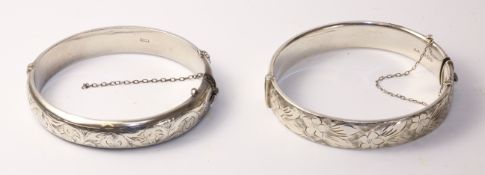 Two silver hinged bangles with bright cut decoration hallmarked approx 2.