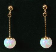 Pair of 9ct gold pendant opal ear-rings stamped 375 Condition Report <a