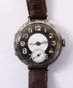 WWl officer's silver trench wristwatch London 1916 on original brown leather strap