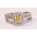 18ct white gold ring set with an cushion cut yellow diamond surrounded by eighteen diamonds with a