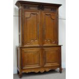19th century French carved oak cupboard, fitted with four shaped panelled doors,