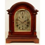 Early 20th century mahogany arched top bracket clock, silvered engraved dial with chime silent,